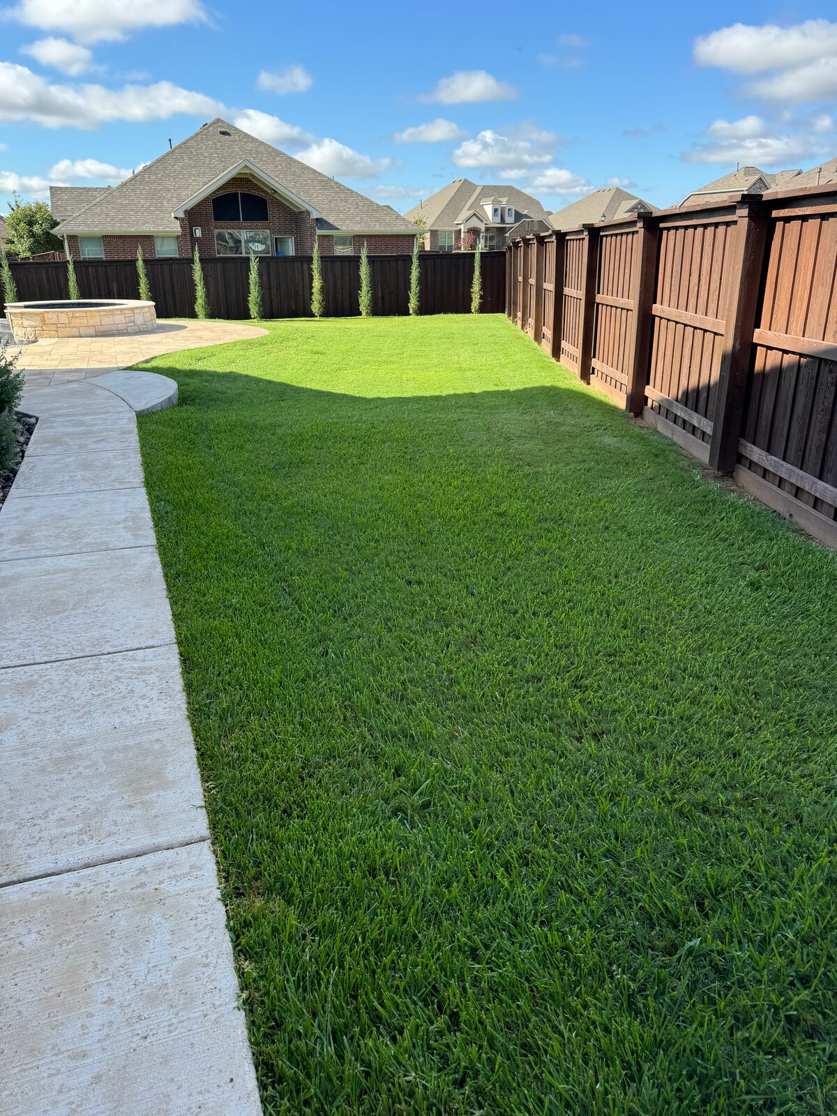 Freshly treated front lawn at a Rockwall County home