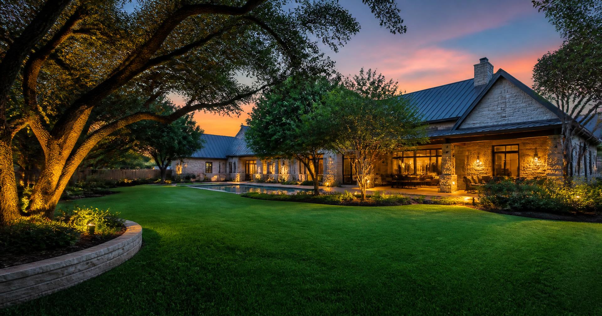 Healthy green North Texas lawn at dusk